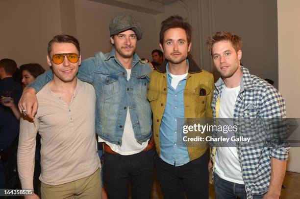 Actors Adam Kudynski, Mark Ovino, Justin Chatwin and Shaun Sipos attend Summit on the Summit's World Water Day Photo Exhibit at Siren Studios on...