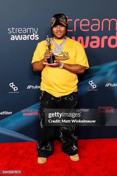 Fanum poses with the Streamy Award for Breakout Streamer during the 2023 Streamy Awards at Fairmont Century Plaza on August 27, 2023 in Los Angeles,...