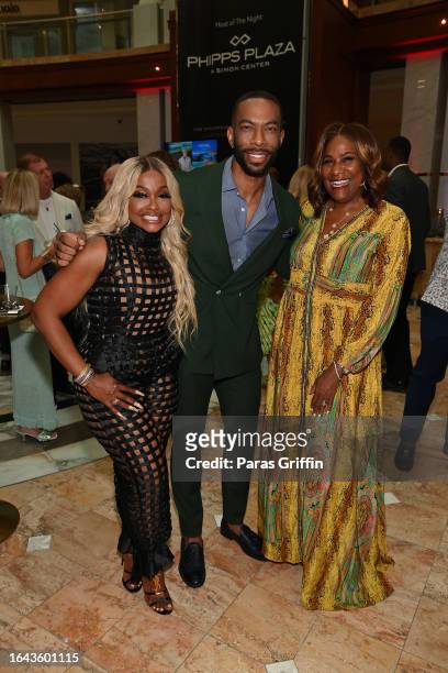 Phaedra Parks, Jonathan Martin and Karyn Greer attend 2023 Fashion Statement at Phipps Plaza on August 27, 2023 in Atlanta, Georgia.