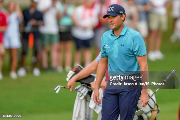 Adam Schenk of the United States walks to the green from the fairway on hole during the final round of the TOUR Championship at East Lake Golf Club...