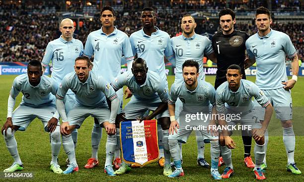 France's defender Christophe Jallet, defender Raphael Varane, midfielder Paul Pogba, forward Karim Benzema, captain and Goalkeeper Hugo Lloris,...