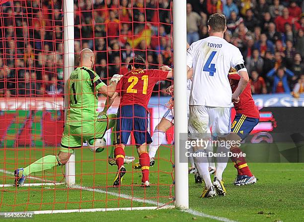 Niki Maenpaa of Finland saves the ball from crossing the goal line during the FIFA 2014 World Cup Qualifier between Spain and Finland at estadio El...
