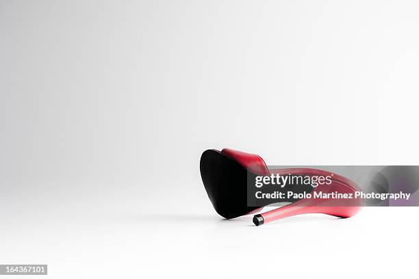 red sandal stilettos lying - soles pose stock pictures, royalty-free photos & images