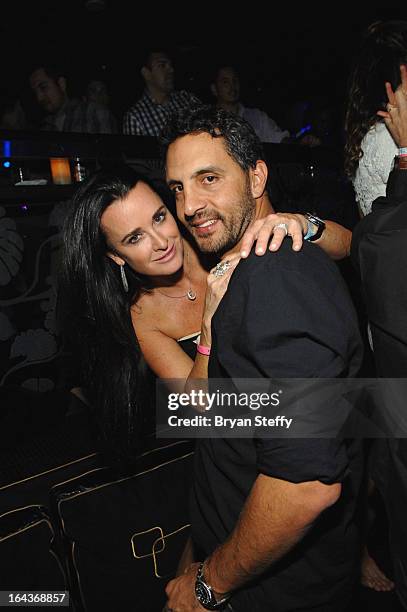 Television personality Kyle Richards and Mauricio Umansky appear during the SkyBlu performance at The Bank Nightclub at the Bellagio as he kicks off...