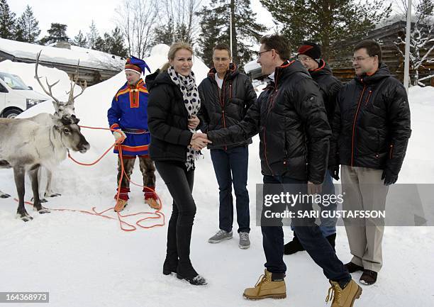 Prime Minister of Denmark Helle Thorning-Schmidt greets Finnish Prime Minister Jyrki Katainen next to Finnish Minister for European Affairs and...