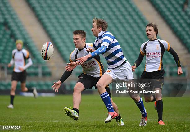 Henry Longhurst of QEDS Wakfield and Jack Ashford of Warwick School challenge for the ball during the Daily Mail RBS Schools' Day Under 15 Cup Final...