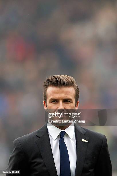British football player David Beckham attends a meeting with the Youth Football Team at Hankou Literary and Sports Center on March 23, 2013 in Wuhan,...