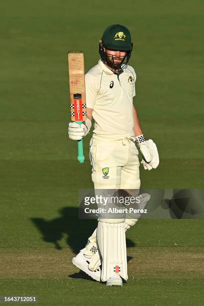 Caleb Jewell of Australia A celebrates his half century during the four day match between Australia A and New Zealand A at Allan Border Field on...