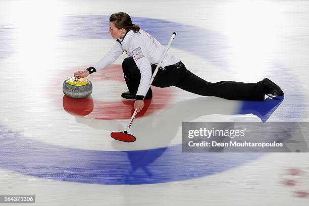 Emma Miskew of Canada throws a stone during the 3rd and 4th Play-Off match between USA and Canada on Day 8 of the Titlis Glacier Mountain World...