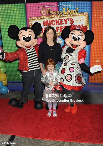 Actress Edie Falco and Macy Falco attend Disney Live! Mickey's Music Festival at Madison Square Garden on March 23, 2013 in New York City.