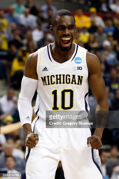 Tim Hardaway Jr. #10 of the Michigan Wolverines reacts in the first half against the Virginia Commonwealth Rams during the third round of the 2013...