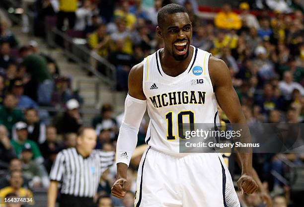 Tim Hardaway Jr. #10 of the Michigan Wolverines reacts in the first half against the Virginia Commonwealth Rams during the third round of the 2013...