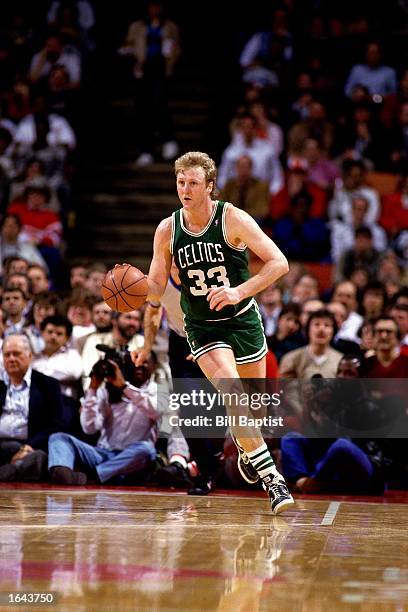 Larry Bird of the Boston Celtics drives to the basket during a 1990 NBA game against the Houston Rockets at the Summit in Houston, Texas. NOTE TO...