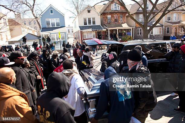 Friends and family of Kimani Gray carry his casket after his funeral service on March 23, 2013 in the Brooklyn borough of New York City. Kimani Gray...