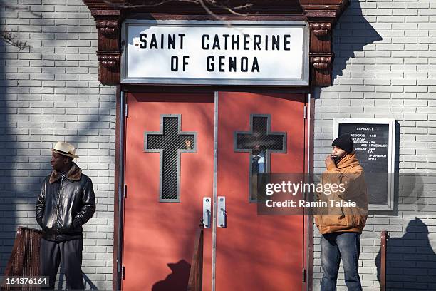 Man looks out the glass window during the funeral of Kimani Gray at St. Catherine of Genoa Church on March 23, 2013 in the Brooklyn borough of New...