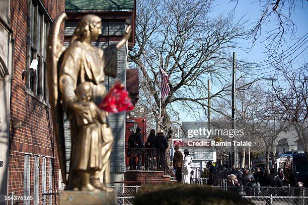 Friends and family of Kimani Gray arrive at St. Catherine of Genoa Church for his funeral on March 23, 2013 in the Brooklyn borough of New York City....