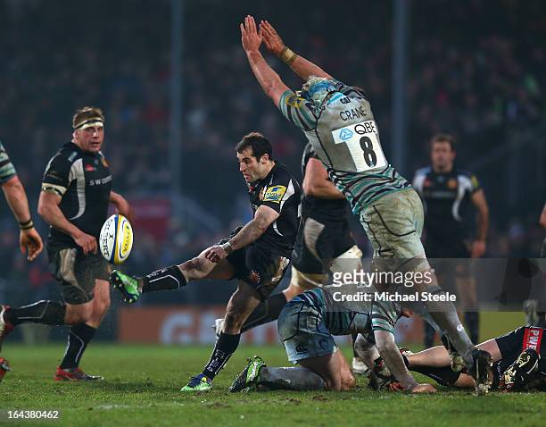 Haydn Thomas of Exeter Chiefs kicks as Jordan Crane of Leicester Tigers attempts to block during the Aviva Premiership match between Exeter Chiefs...