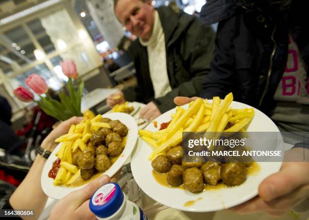 Meat balls are served in a restaurant of Ikea in Amsterdam on March 23, 2013. Swedish furniture giant Ikea said last week it had started gradually...