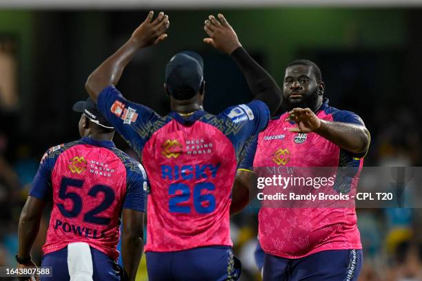 Rahkeem Cornwall of Barbados Royals celebrates the dismissal of Andre Fletcher of Saint Kitts and Nevis Patriots during the Men's 2023 Republic Bank...