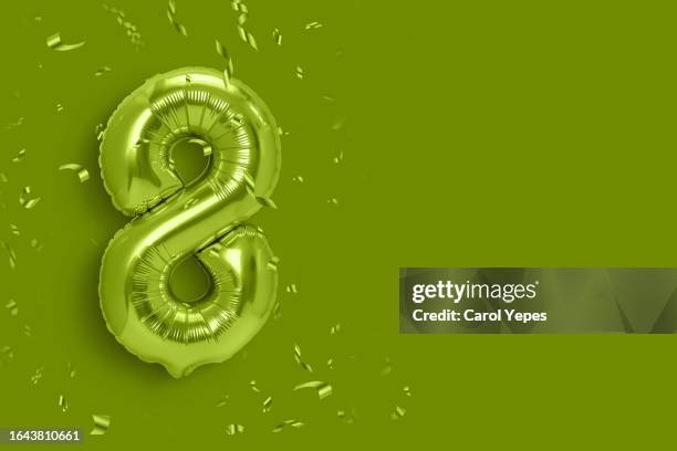 number  eight in green foil balloon - number 2 balloon stock pictures, royalty-free photos & images