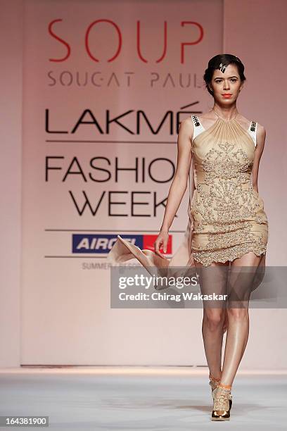 Model showcases designs by Sougat Paul on the runway during day two of the Lakme Fashion Week Summer/Resort 2013 on March 23, 2013 at Grand Hyatt in...