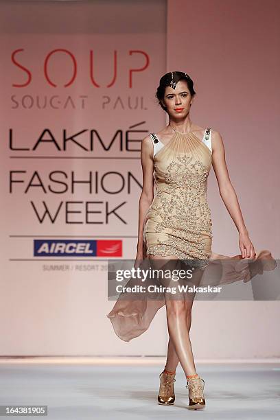 Model showcases designs by Sougat Paul on the runway during day two of the Lakme Fashion Week Summer/Resort 2013 on March 23, 2013 at Grand Hyatt in...