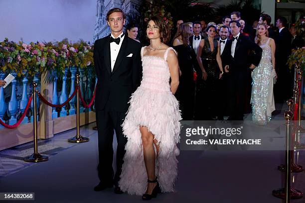 Pierre and Charlotte Casiraghi arrive for the annual Rose Ball at the Monte-Carlo Sporting Club in Monaco, on March 23, 2013.. The Rose Ball is one...