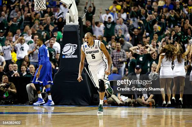 Adreian Payne of the Michigan State Spartans celebrates in the second half against the Memphis Tigers during the third round of the 2013 NCAA Men's...