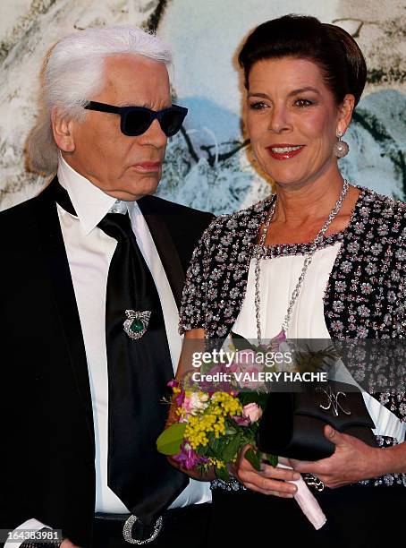 German fashion designer Karl Lagerfeld and Princess Caroline of Hanover pose prior to attend the "Bal de la Rose du Rocher" at the Monte-Carlo...