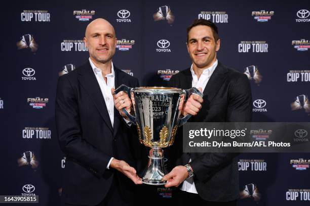 Chris Judd, the 2023 Norm Smith medal presenter and Josh Kennedy, the 2023 premiership cup ambassador pose for a photo during the official launch of...