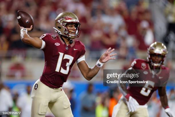 Florida State Seminoles quarterback Jordan Travis passes the ball during a college football game against the LSU Tigers on September 03, 2023 at...