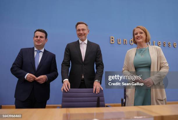 German Finance Minister Christian Lindner of the German Free Democrats , Families Minister Lisa Paus of the Greens Party and Labour and Social...