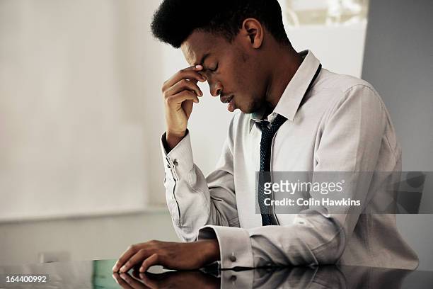 black male under stress - man headache bildbanksfoton och bilder