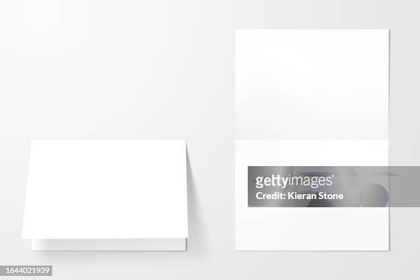 folded blank paper inside and out - gefältelt stock-fotos und bilder