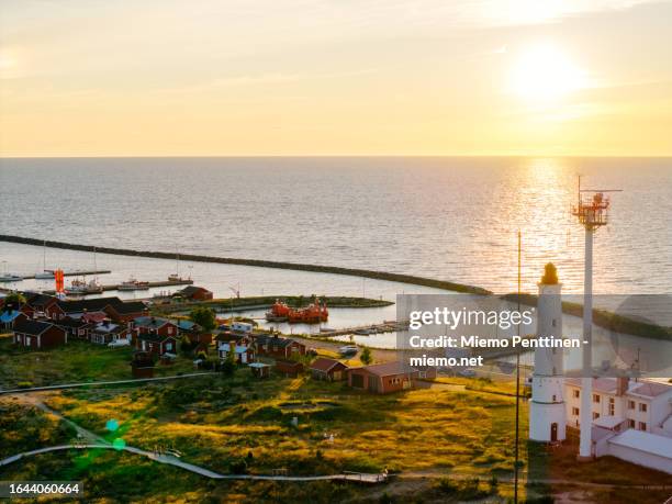 aerial view of an old lighthouse and small fishing huts on hailuoto island in northern finland - gulf of bothnia stock pictures, royalty-free photos & images