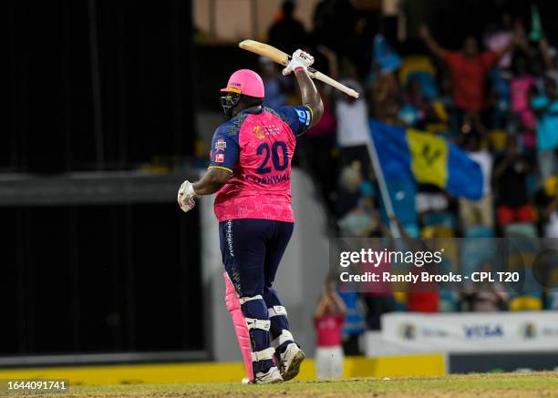 Rahkeem Cornwall of Barbados Royals celebrates his century during the Men's 2023 Republic Bank Caribbean Premier League match 18 between Barbados...