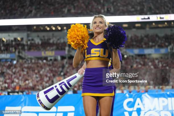 An LSU Tigers cheerleader performs of the fans during the Camping World Kickoff game between the LSU Tigers and the Florida State Seminoles, on...