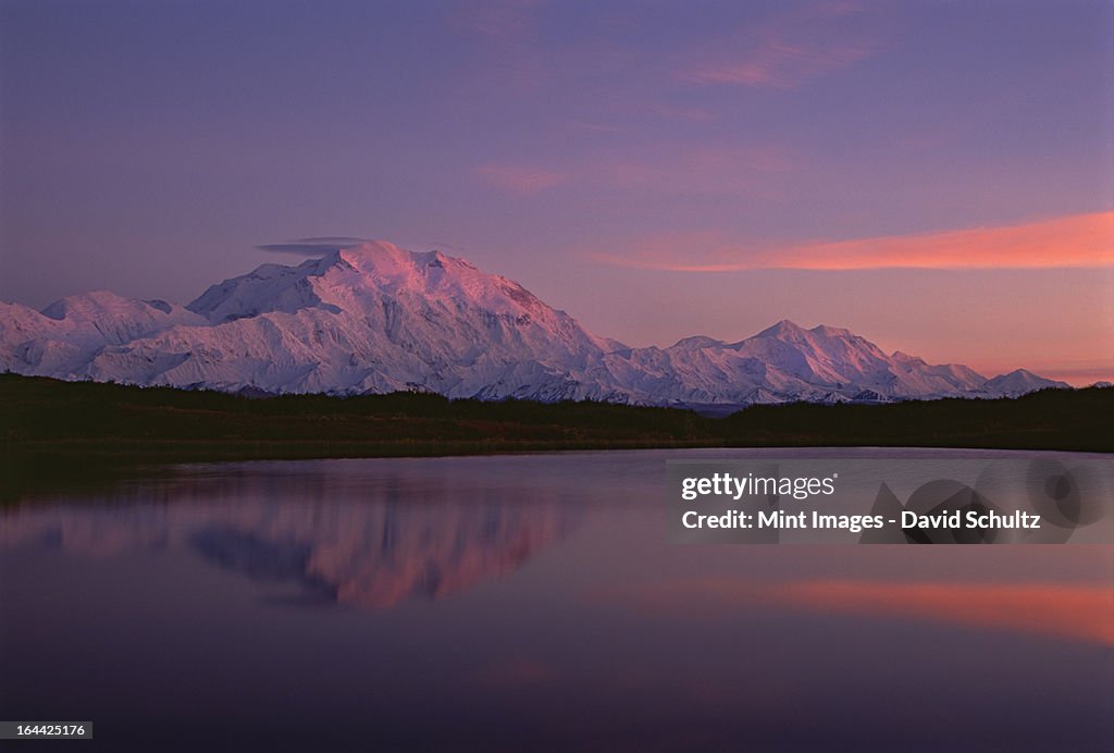 Sunset, Mount McKinley in Denali National Park, Alaska reflected in Reflection Pond.