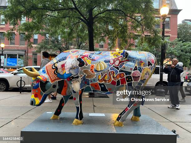 Life-size cow sculpture is on display during CowParade New England presented by Herb Chambers on August 25, 2023 in Boston, Massachusetts.