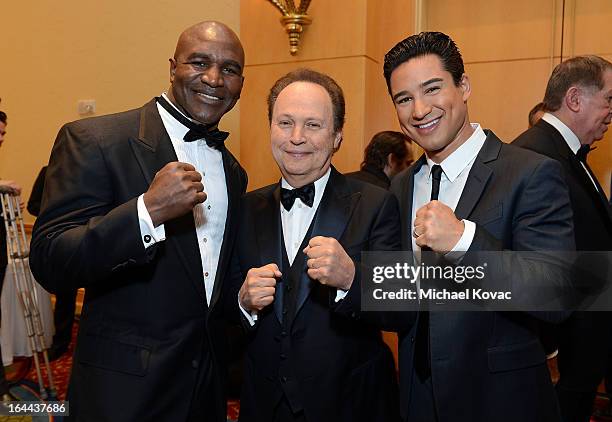 Boxer Evander Holyfield, Actor Billy Crystal, and TV Personality Mario Lopez with Moet & Chandon at Celebrity Fight Night XIX at JW Marriott Desert...