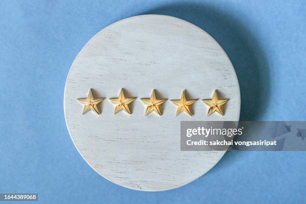 concept of excellence, gold stars, five stars - 5 star review stock pictures, royalty-free photos & images