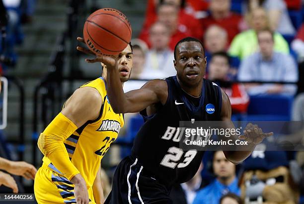 Khyle Marshall of the Butler Bulldogs catches a pass against Jake Thomas of the Marquette Golden Eagles in the second half during the third round of...