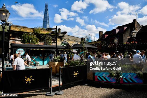 General view of people drinks on pub near Bankside on August 21, 2023 in London, England. London is the capital of England, many of the inhabitants,...