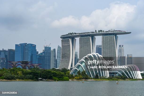 The Marina Bay Sands hotel is seen among high rise buildings in Singapore on September 4, 2023.