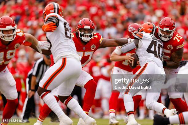 Lucas Niang of the Kansas City Chiefs prepares to blocks during the first quarter of a preseason game against the Cleveland Browns at GEHA Field at...