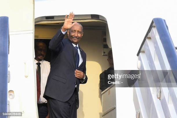 President of Sudan's Transitional Sovereignty Council General Abdel Fattah al-Burhan boards an airplane at Port Sudan airport, heading to South...