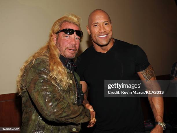 Personality Duane 'Dog' Chapman and actor Dwayne Johnson attend Nickelodeon's 26th Annual Kids' Choice Awards at USC Galen Center on March 23, 2013...