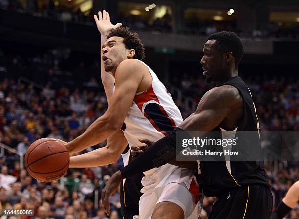 Elias Harris of the Gonzaga Bulldogs goes up for a shot against Ehimen Orukpe of the Wichita State Shockers in the second half during the third round...