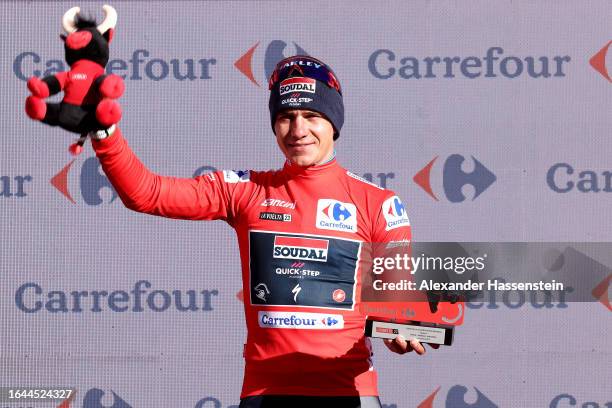 Remco Evenepoel of Belgium and Team Soudal - Quick Step celebrates at podium as Red Leader Jersey winner during the 78th Tour of Spain 2023, Stage 3...