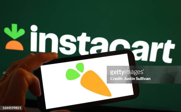 In this photo illustration, the Instacart logo is displayed on a computer monitor on August 28, 2023 in San Anselmo, California. Grocery delivery...